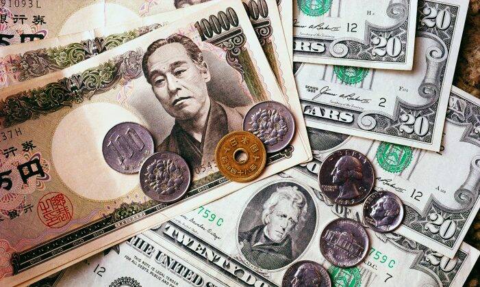 Dollar and Yen banknotes