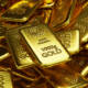 stack of shiny gold bars, precious metal as an investment concept, 3d illustration